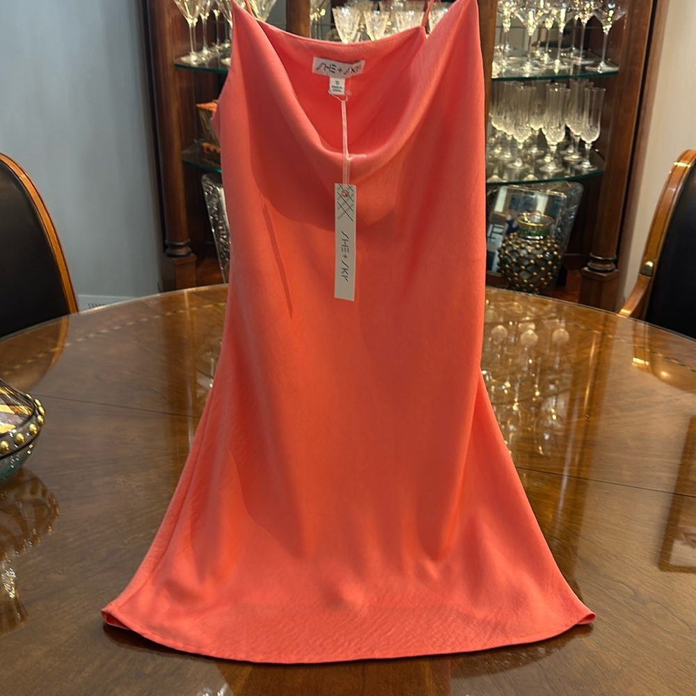 gorgeous brand new spaghetti strap, light tangerine color absolutely beautiful!